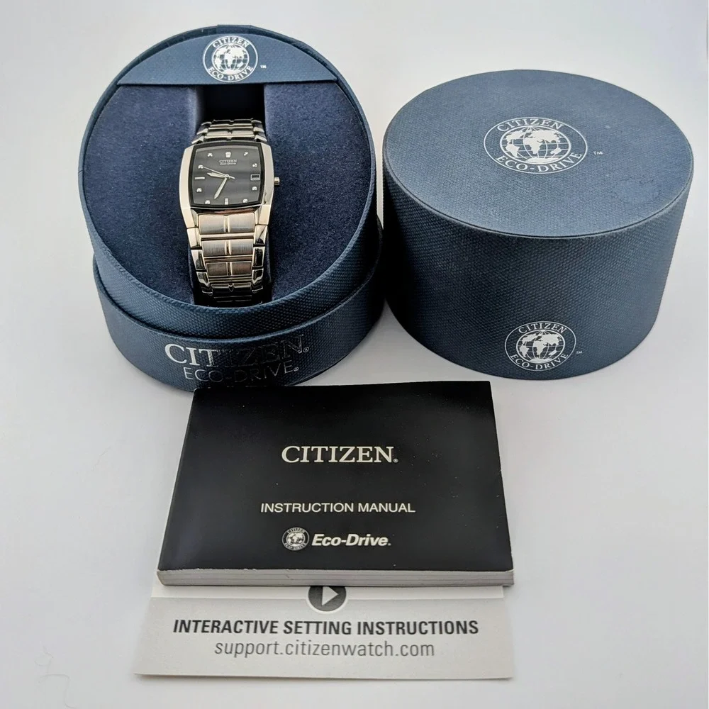 Citizen Eco-Drive E111-S049385 Tonneau Black Dial SS Men's Watch Box Papers